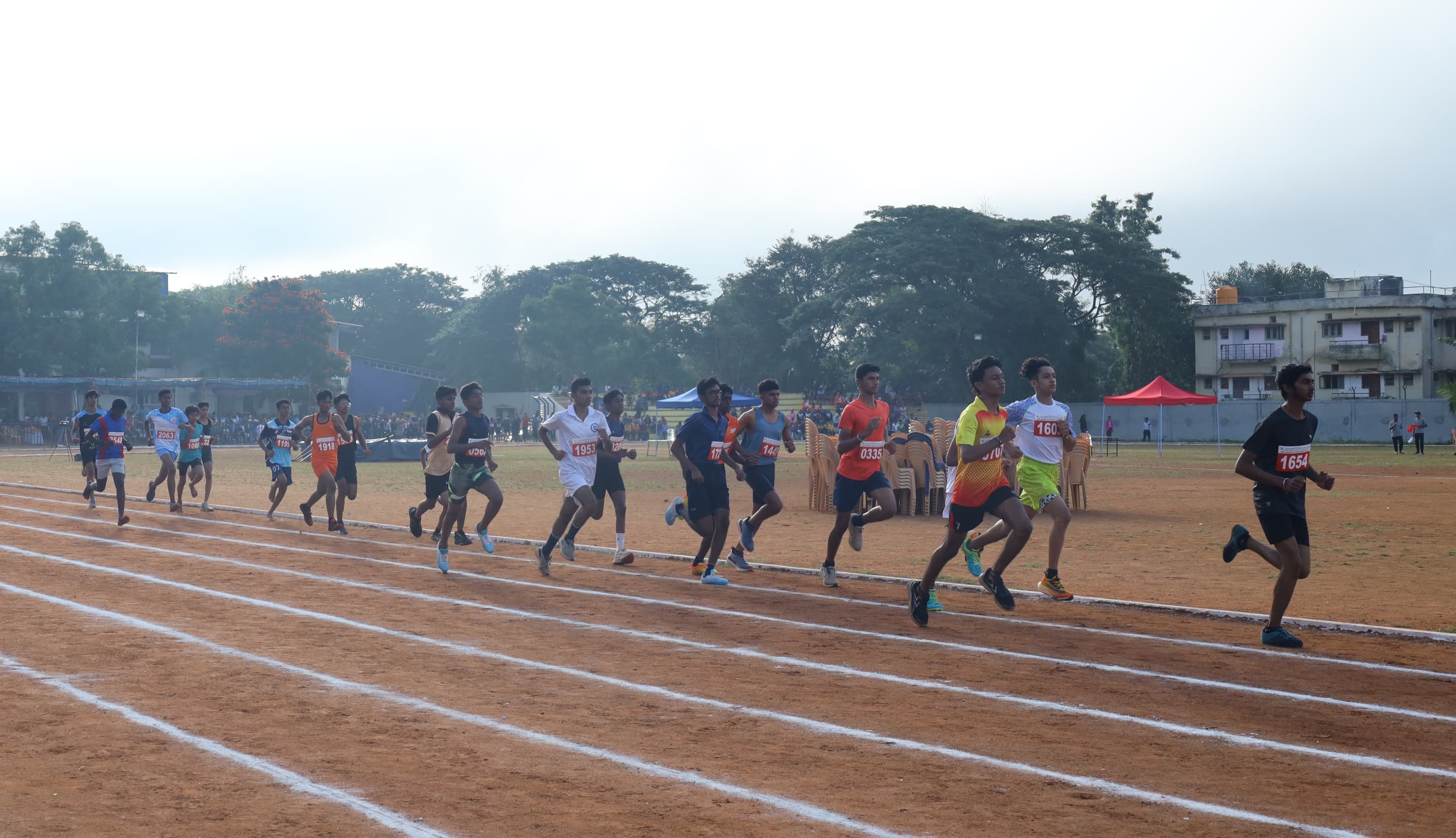 Students competing in a track event at an athletics meet